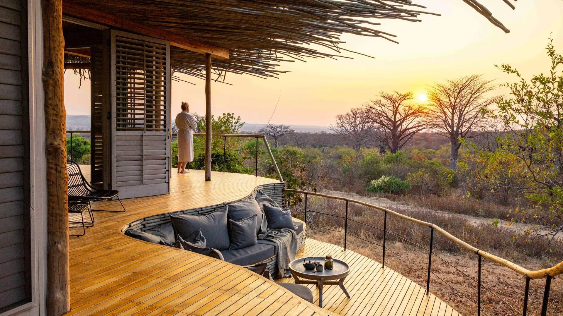 Sunset deck overlooking baobab trees and Ruaha wilderness, Jabali Ridge — Southern Tanzania Safari