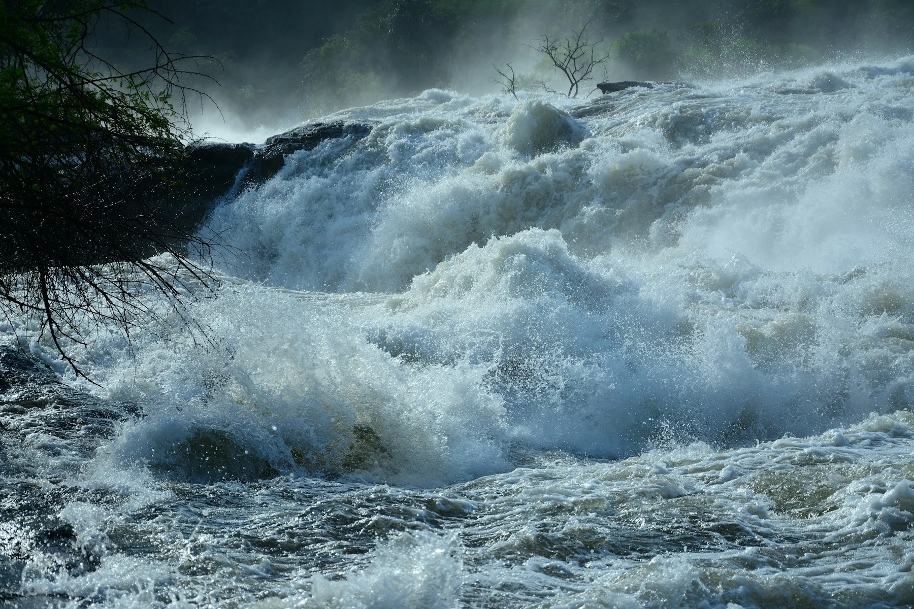 Waters of the Nile thundering through Murchison Falls, Uganda — Orika Africa Tours